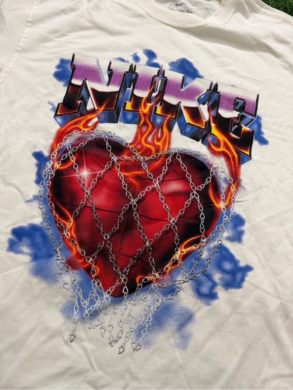 Nike White Tee with Red Flaming Heart and Blue Accent Graphic